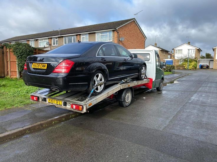 black car towing